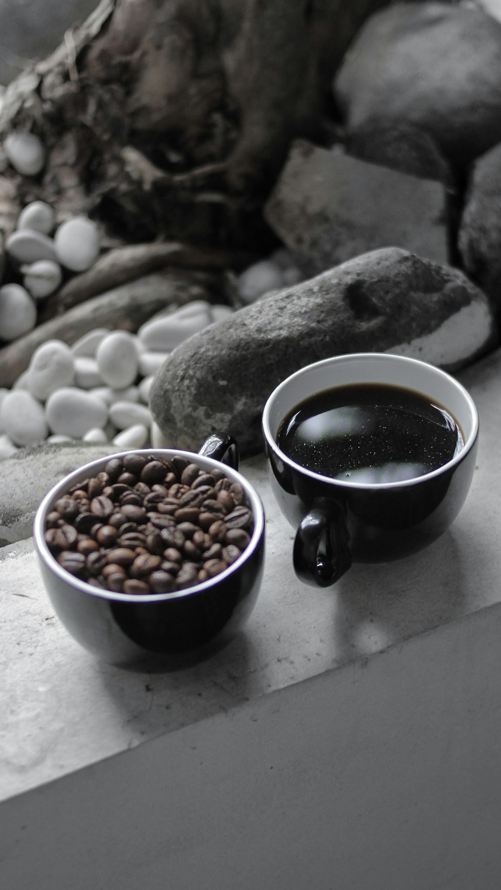 black and white ceramic mug with coffee