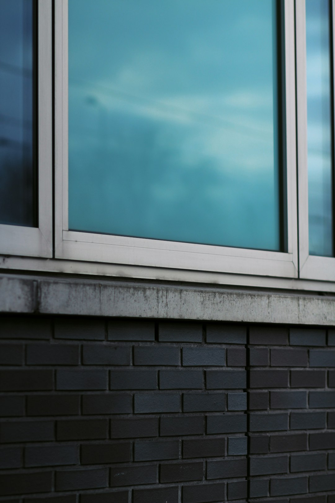 white wooden framed glass window