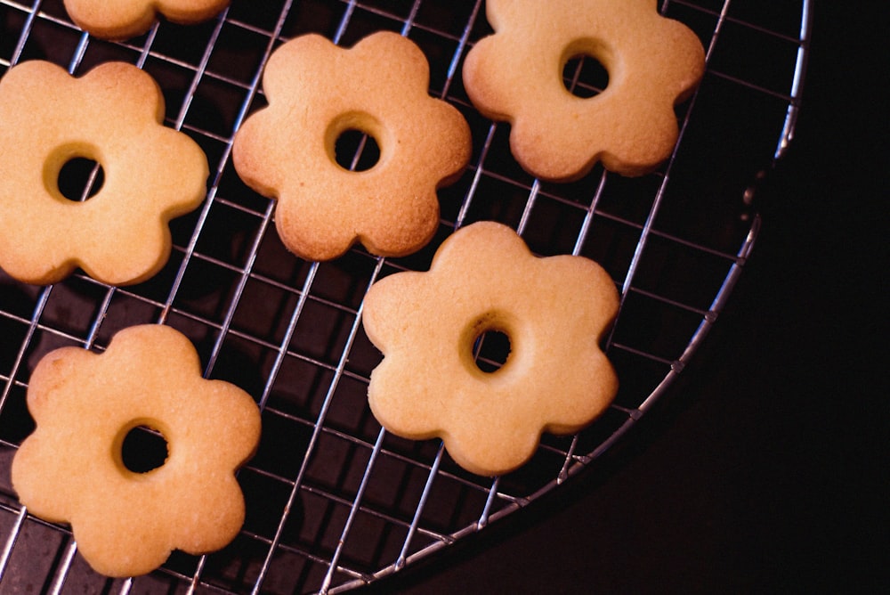 brown cookies on black metal grill