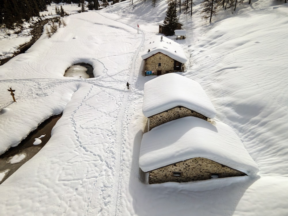 snow covered house during daytime