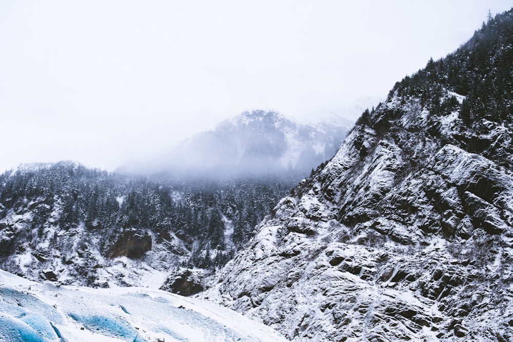 snow covered mountain during daytime