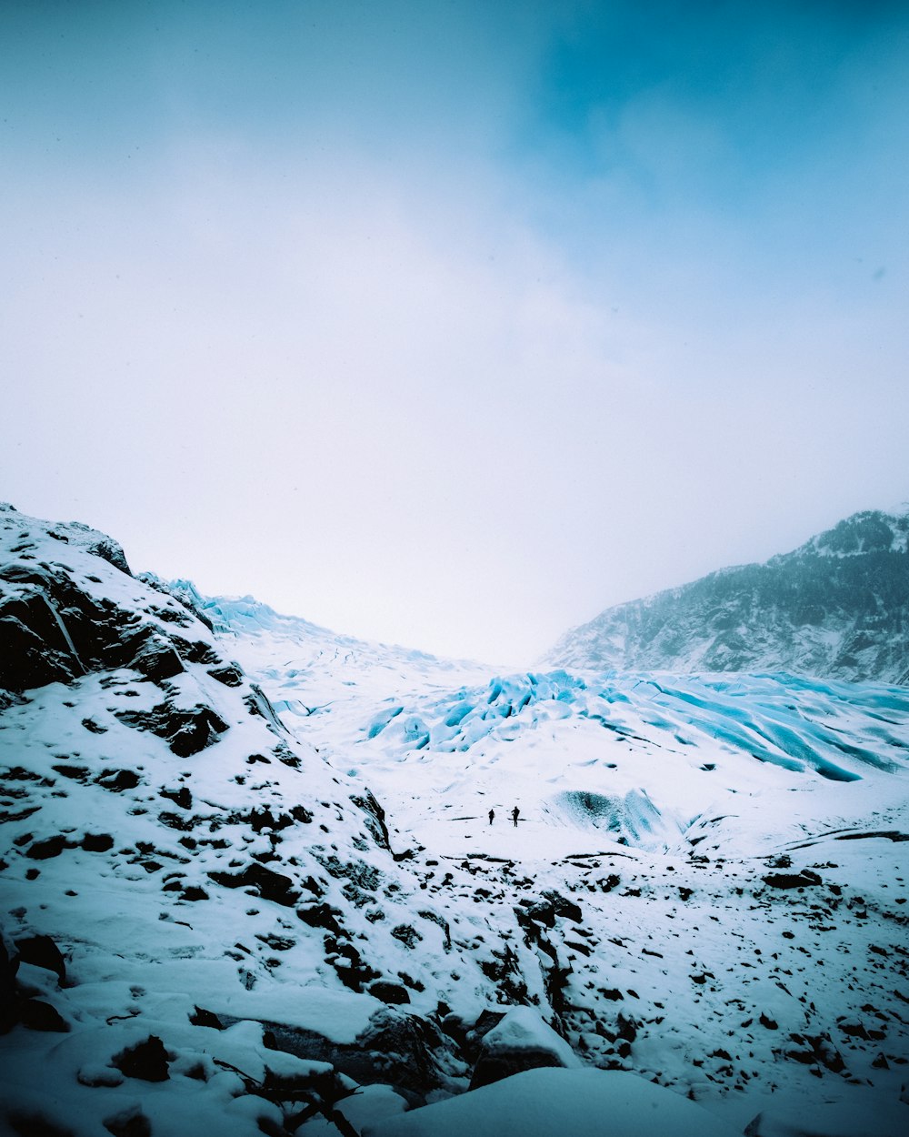 snow covered mountain during daytime