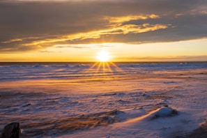 View of the Balneário do Cassino beach at sunrise, blending nature and technology inspiration.