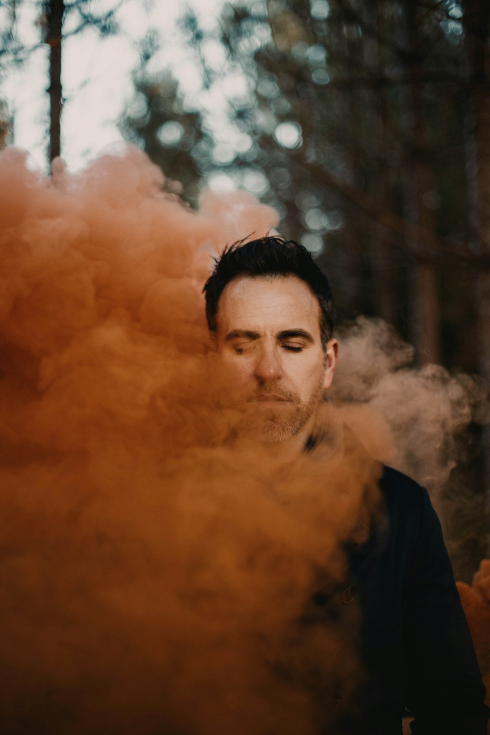 man in black crew neck shirt smoking