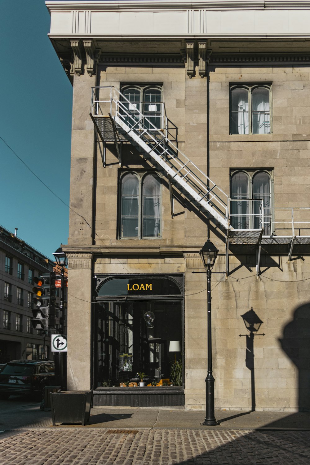 a tall building with a clock on the front of it