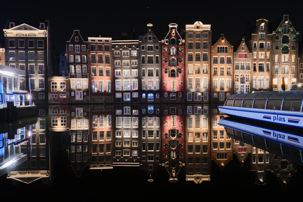 red and white concrete building during night time