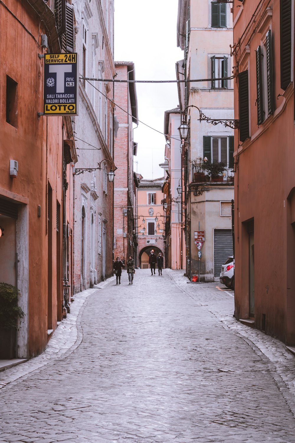 person walking on street during daytime