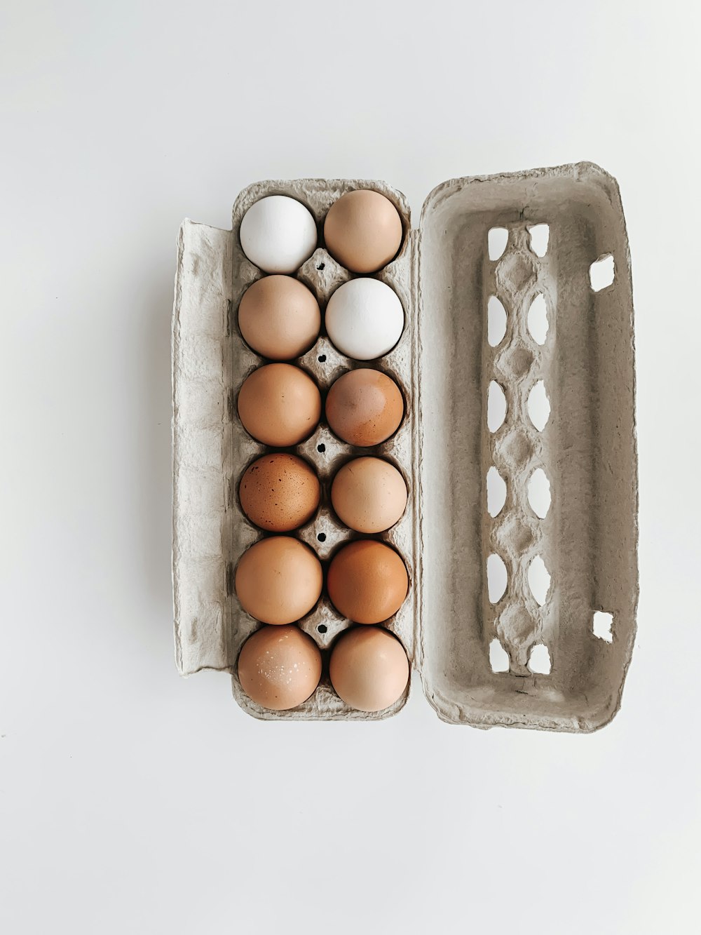 brown eggs in black tray