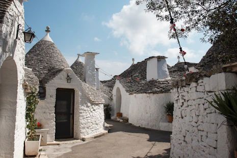 white and gray concrete house under blue sky during daytime