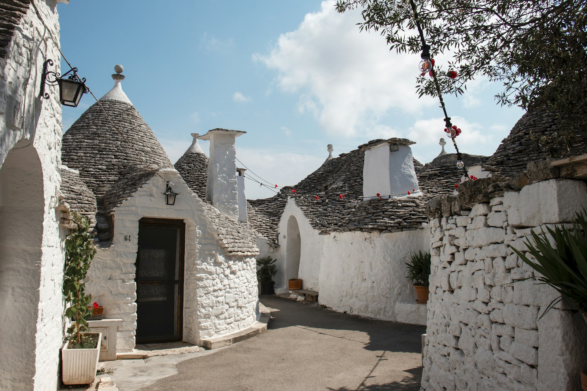 Traditional trullo with blue doors in Alberobello, Puglia