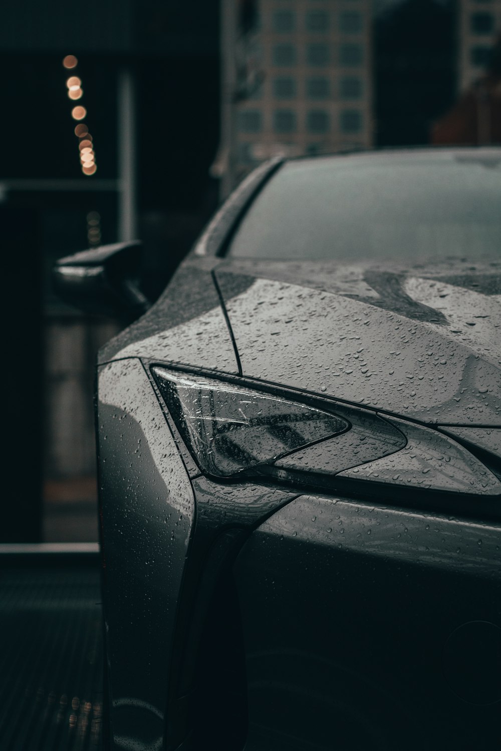 black car on the road during night time