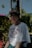 man in white crew neck t-shirt wearing black sunglasses