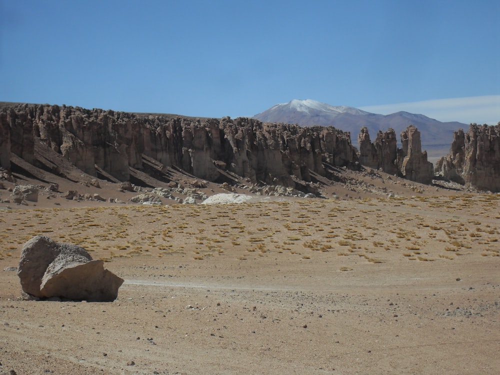 brown rocky mountain under blue sky during daytime