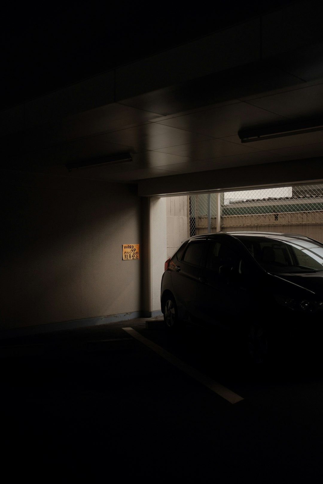 black suv parked in garage