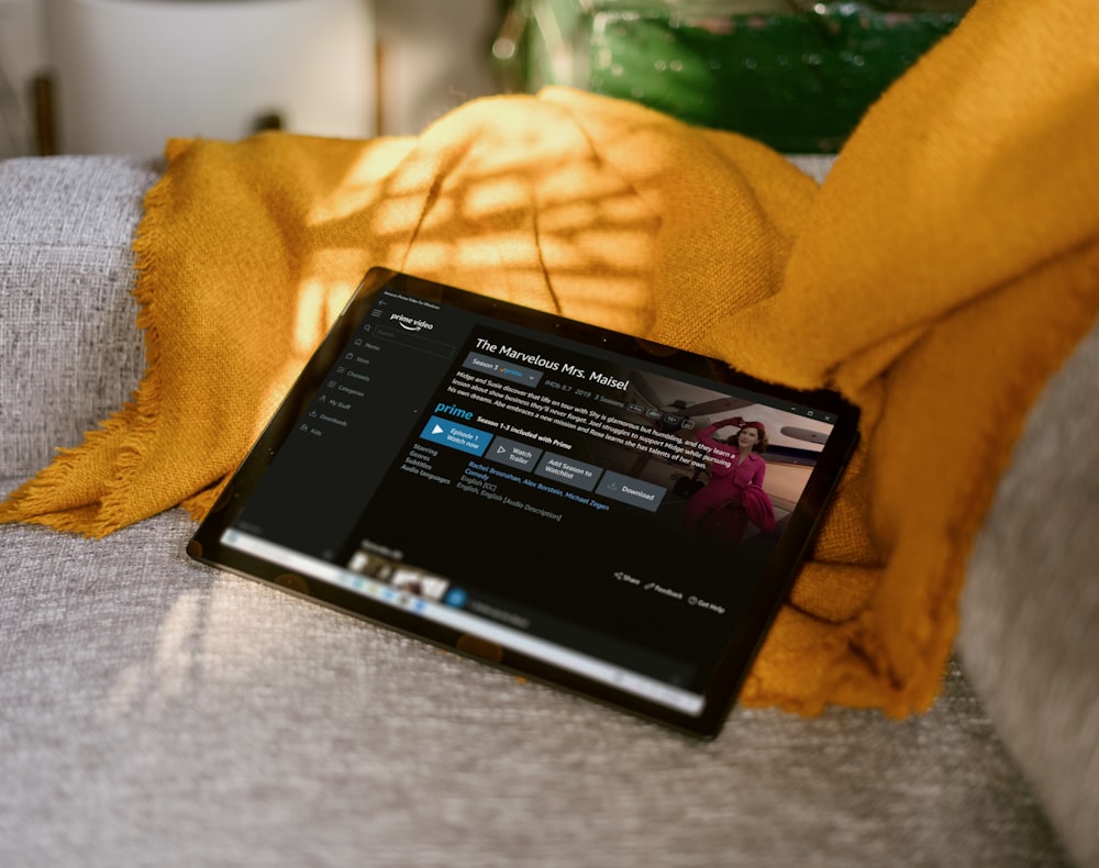 black tablet Surface device on couch