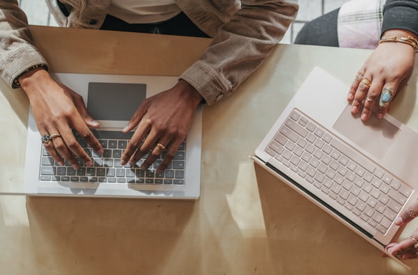 Document scanner on a desk with papers being scanned