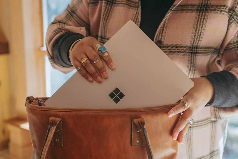 person holding a Surface device