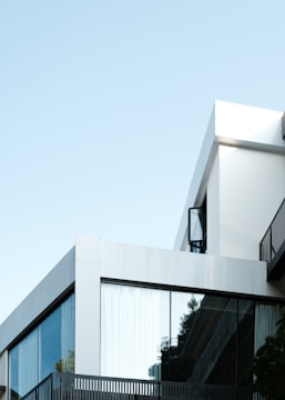 Modern architectural building exterior with clean lines and glass facades.