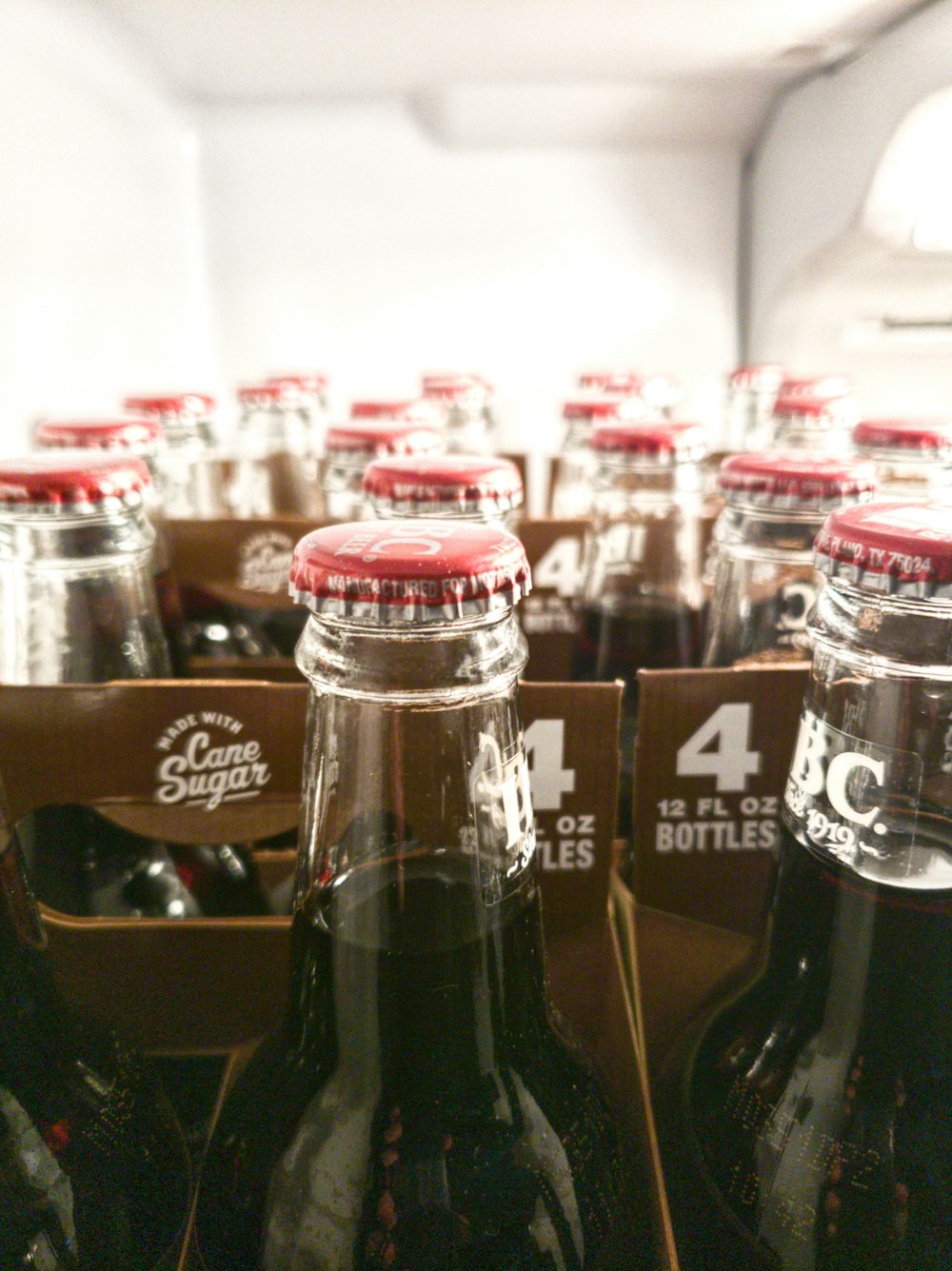 coca cola bottles on shelf