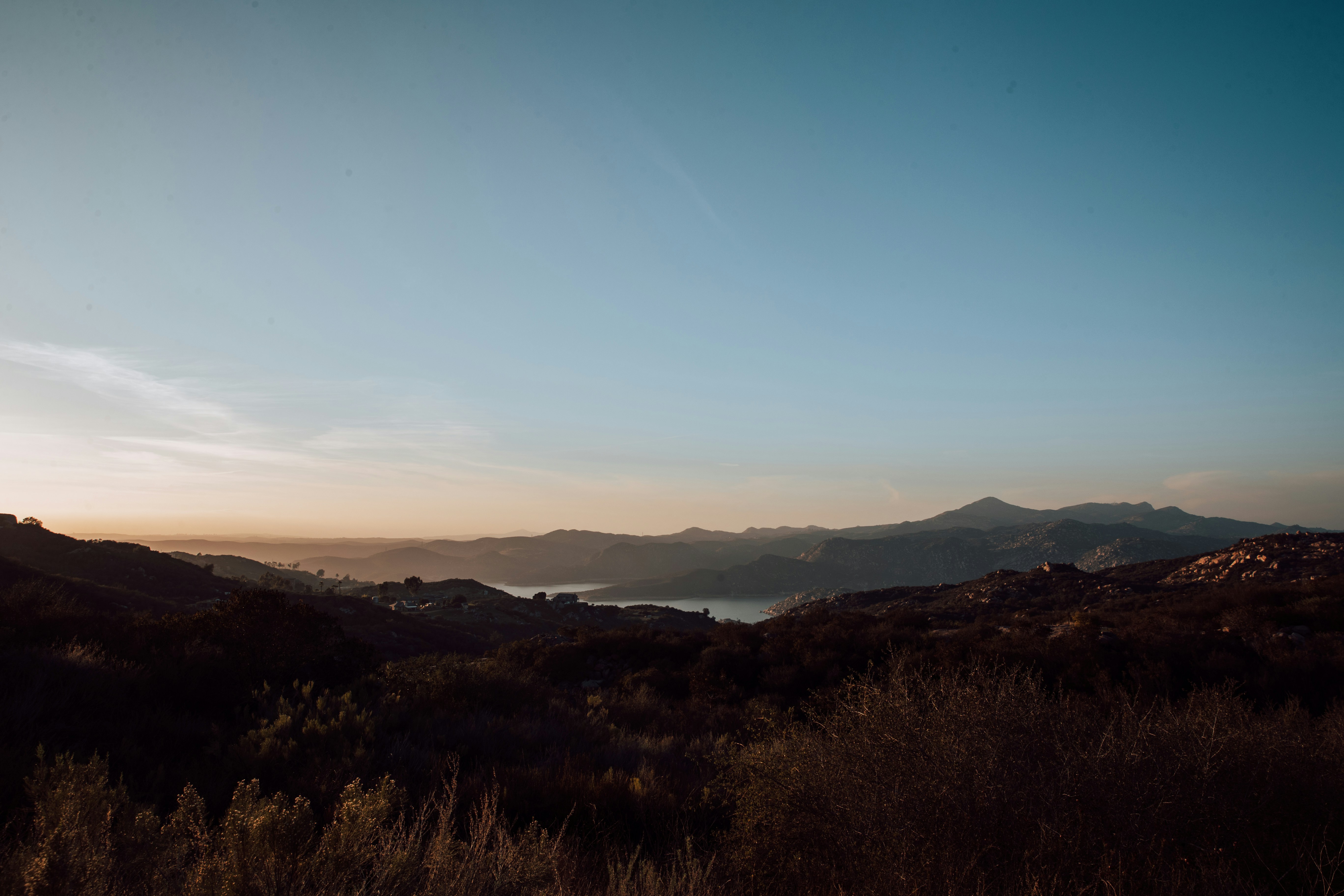 brown mountains under blue sky during daytime