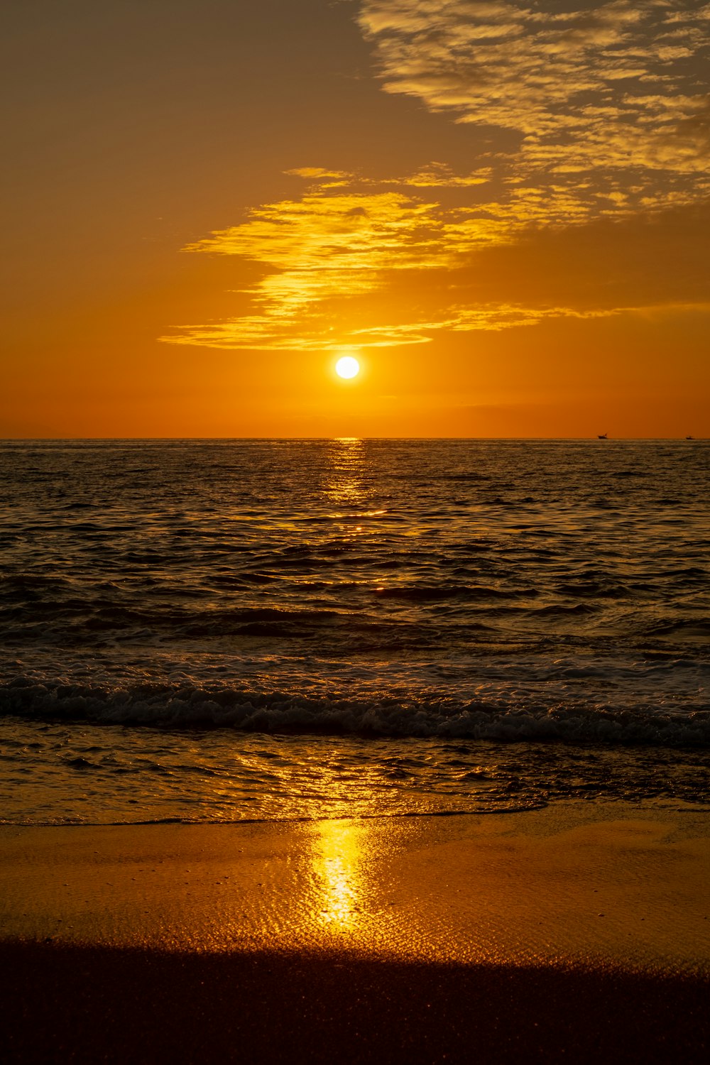 body of water during sunset