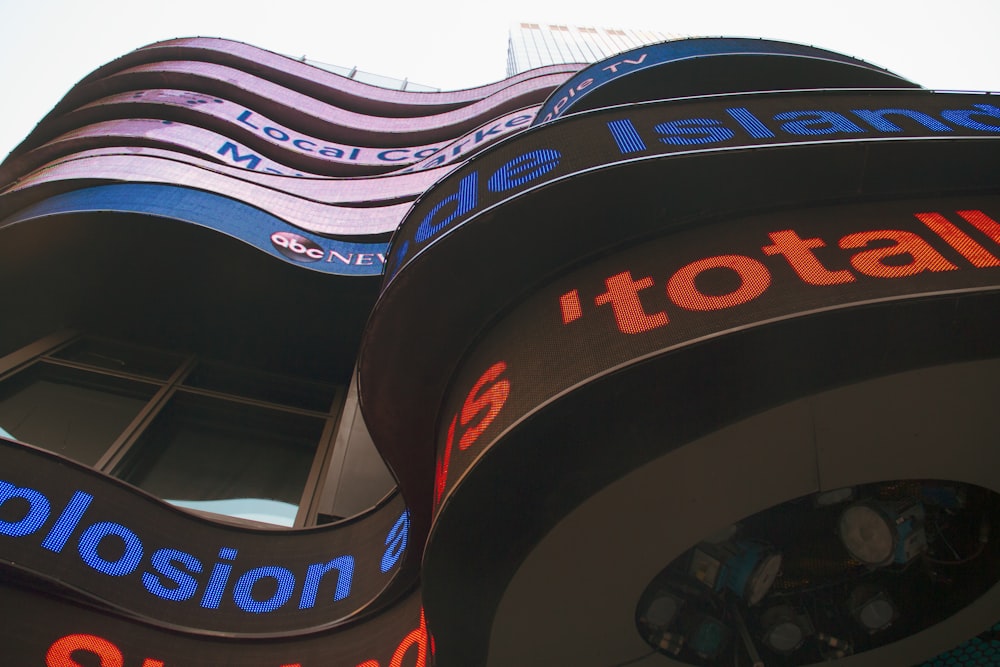 a close up of a building with a lot of signs on it