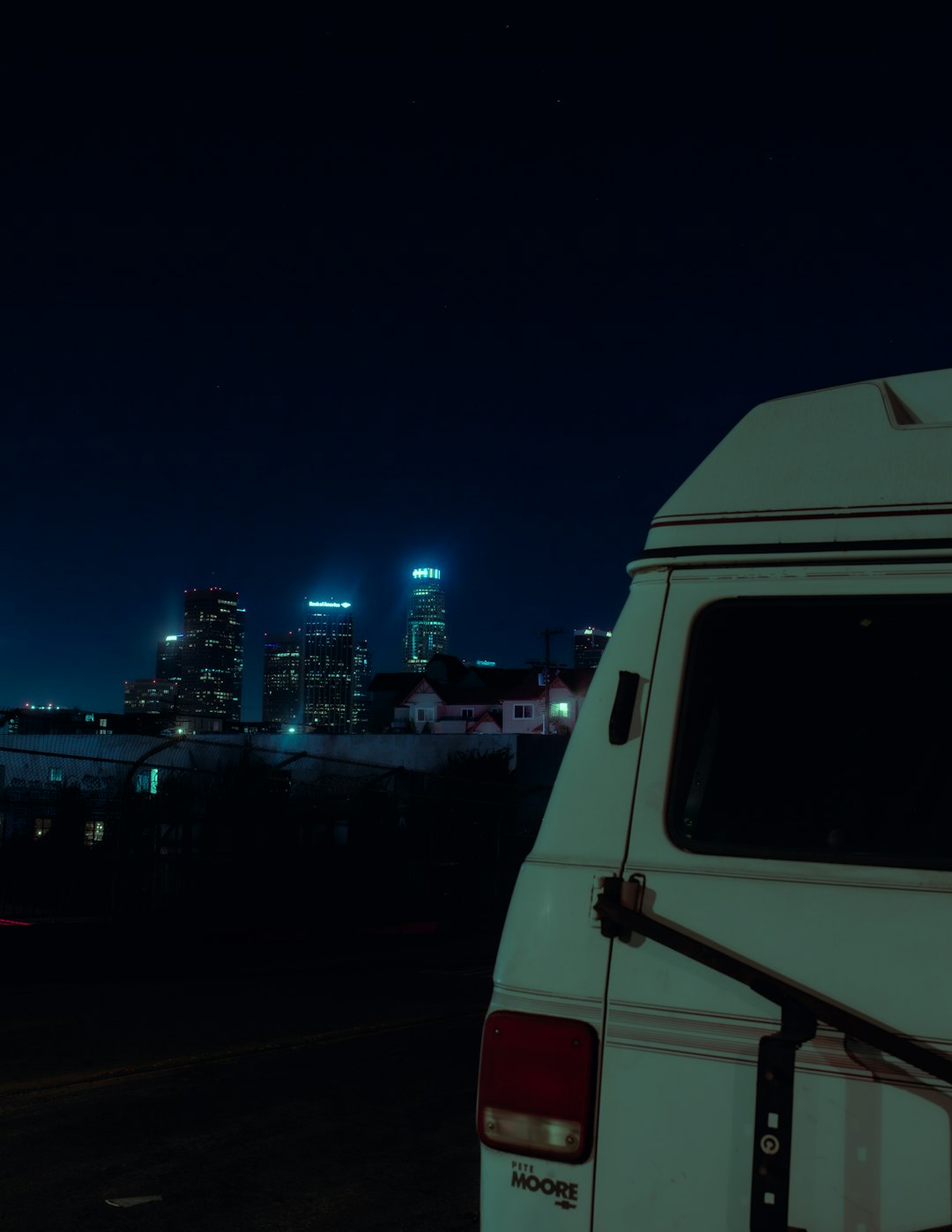 white van on road during night time