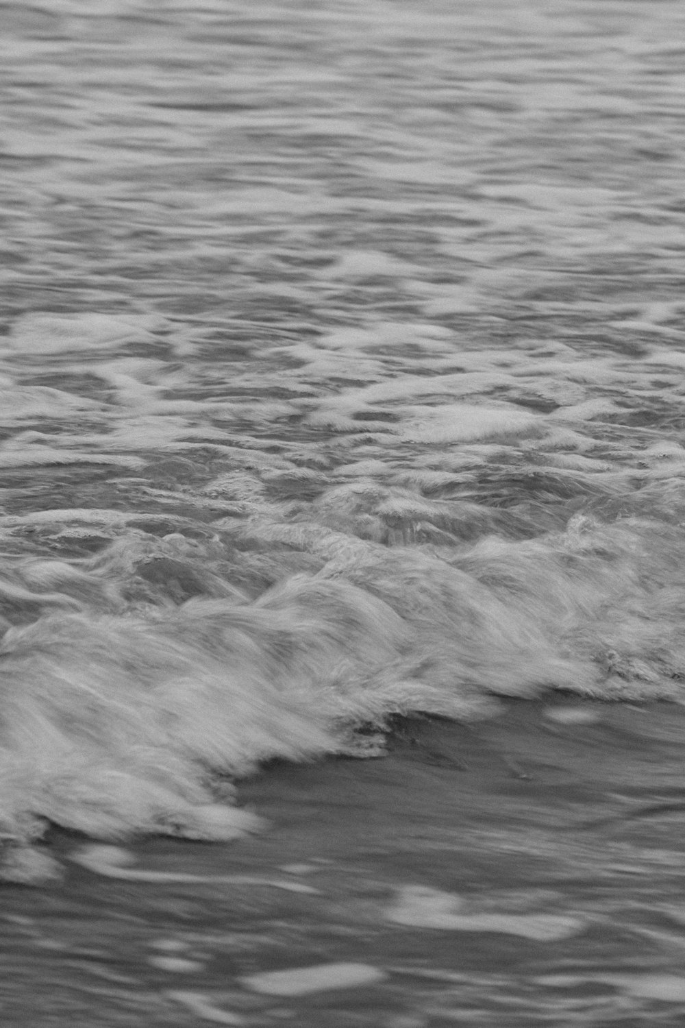 grayscale photo of ocean waves