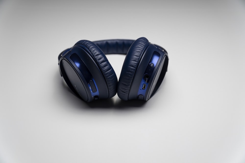 black and blue cordless headphones