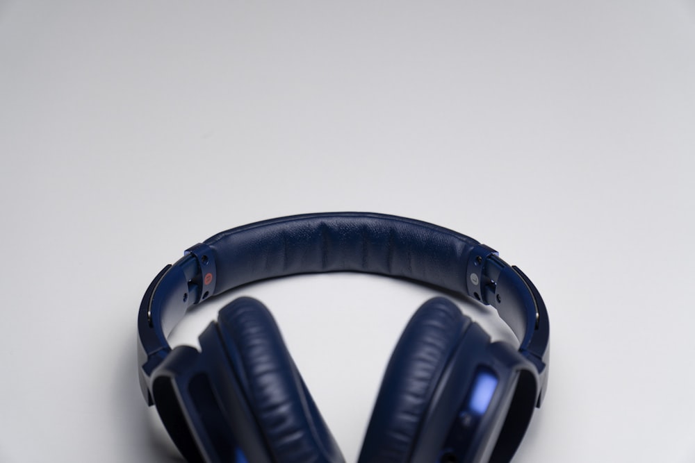 black and blue wireless headphones