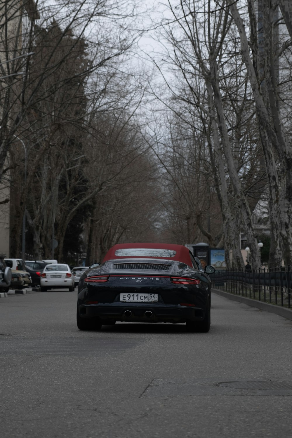 red and black bmw m 3 on road