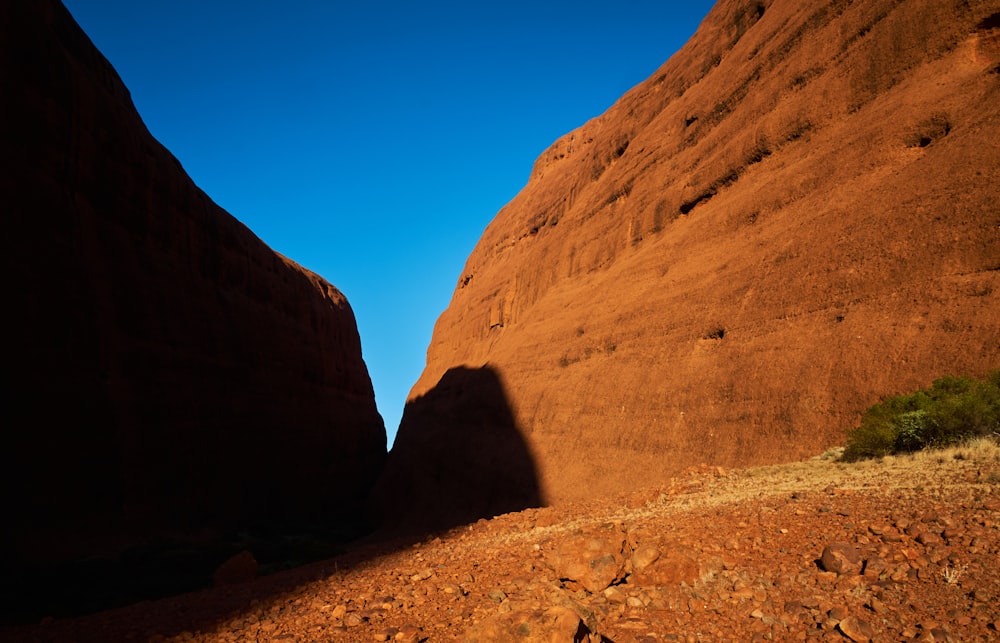 brown rock formation under blue sky during daytime