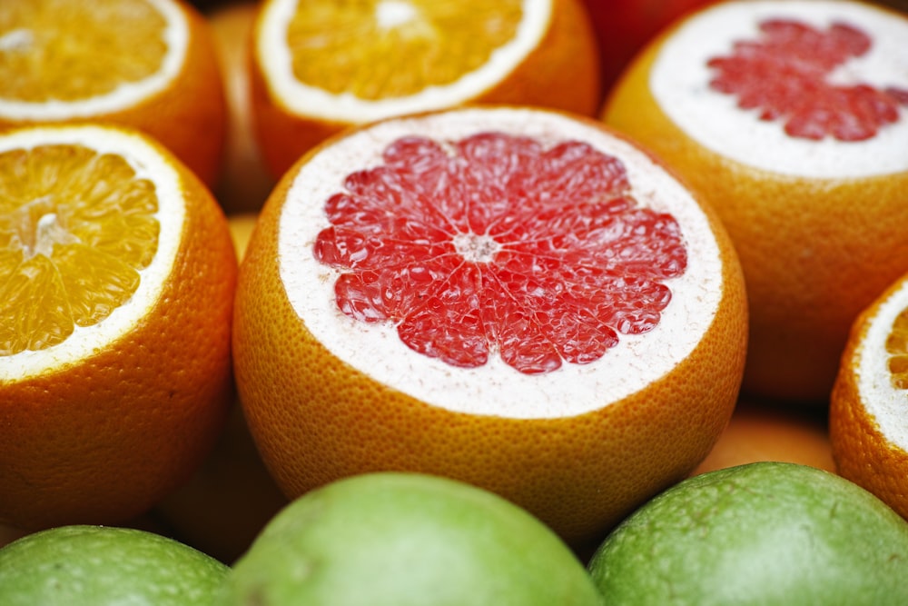 orange fruit on green fruit