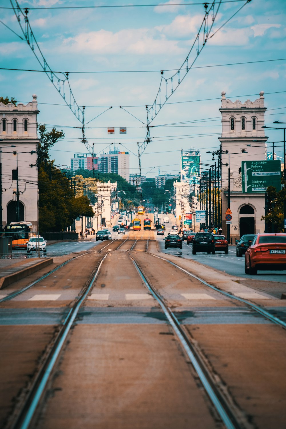 cars on road near buildings during daytime