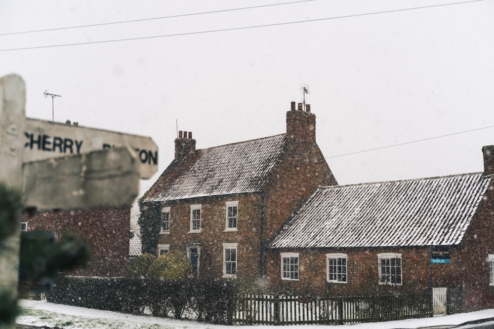 brown brick building under white sky during daytime