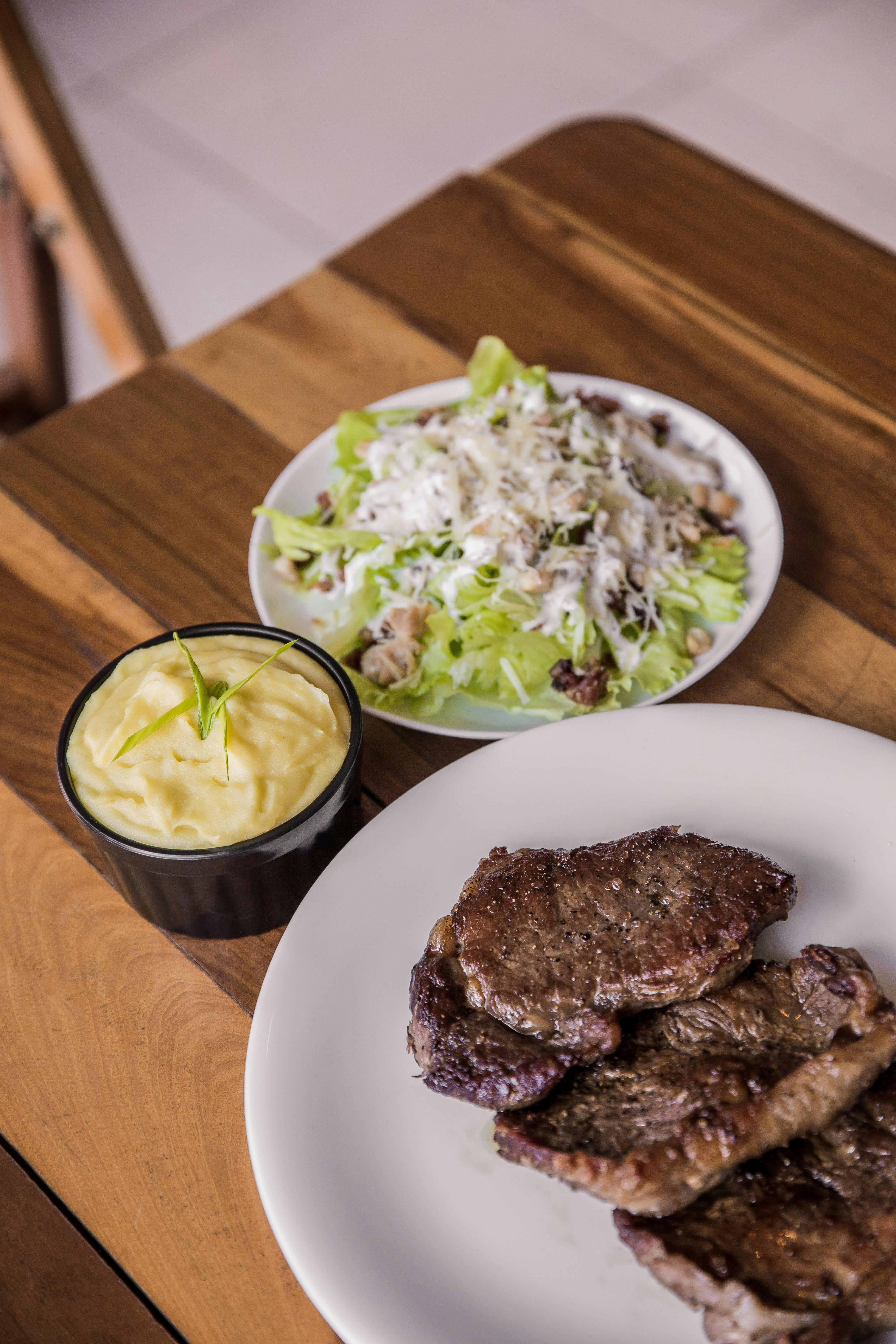 grilled meat on white ceramic plate