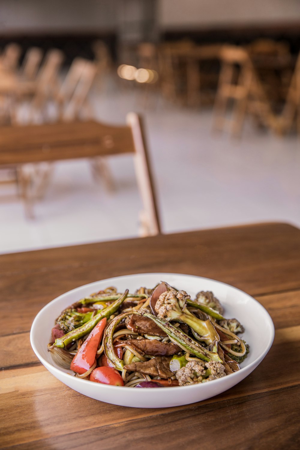 green vegetable on white ceramic plate