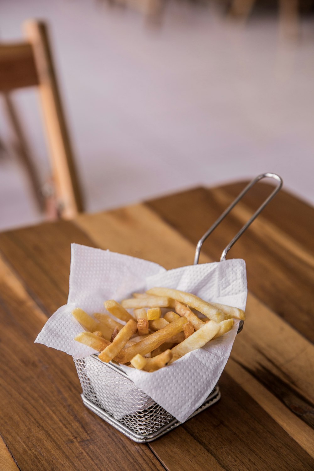 brown paper bag with brown paper clip on brown wooden table