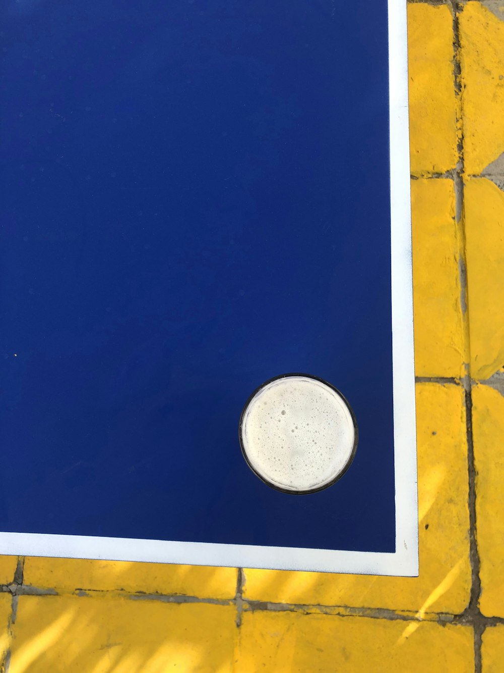 blue and white board with hole