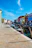 A vibrant street scene in Aveiro with colorful boats and canals.