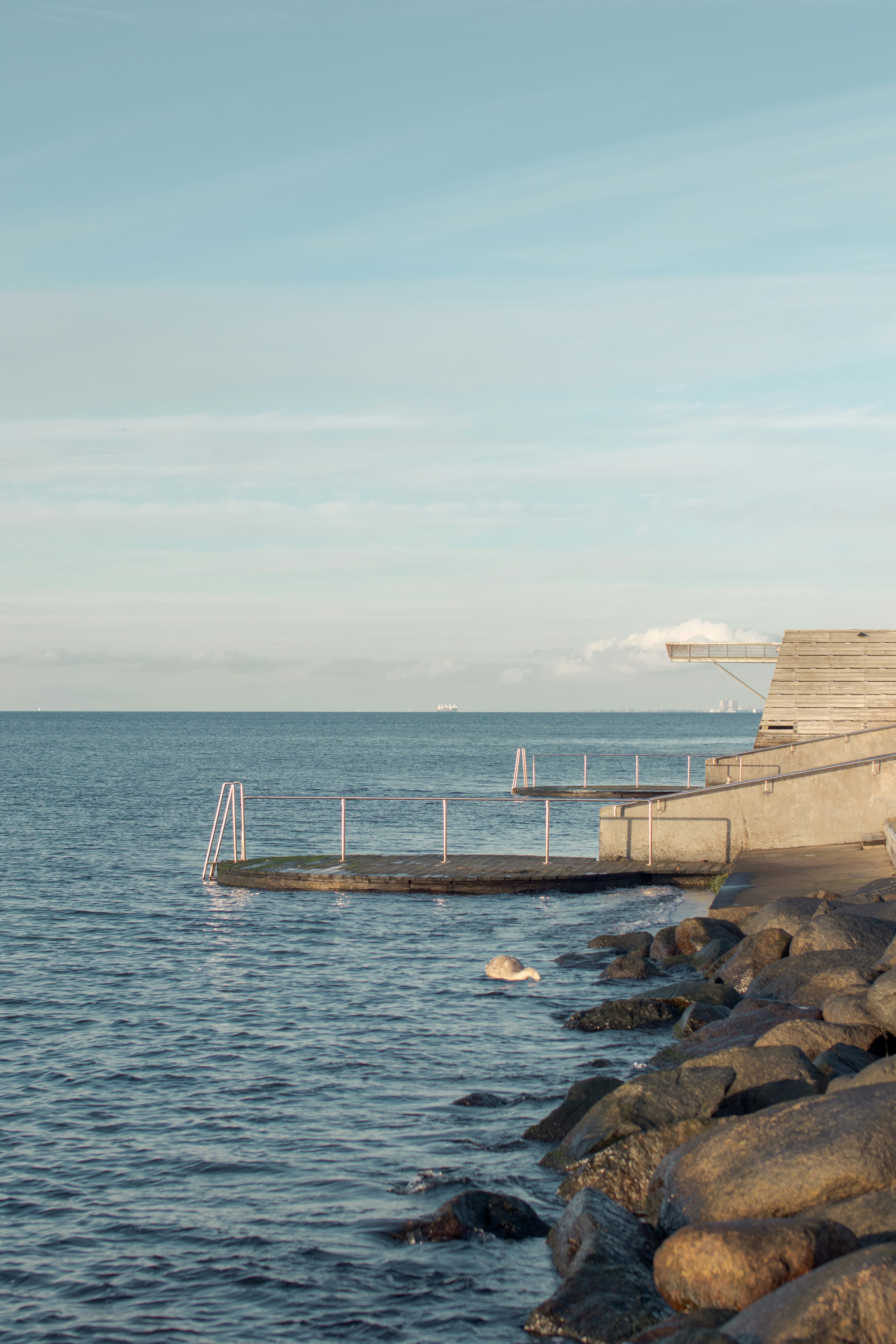 brown wooden boat on sea during daytime