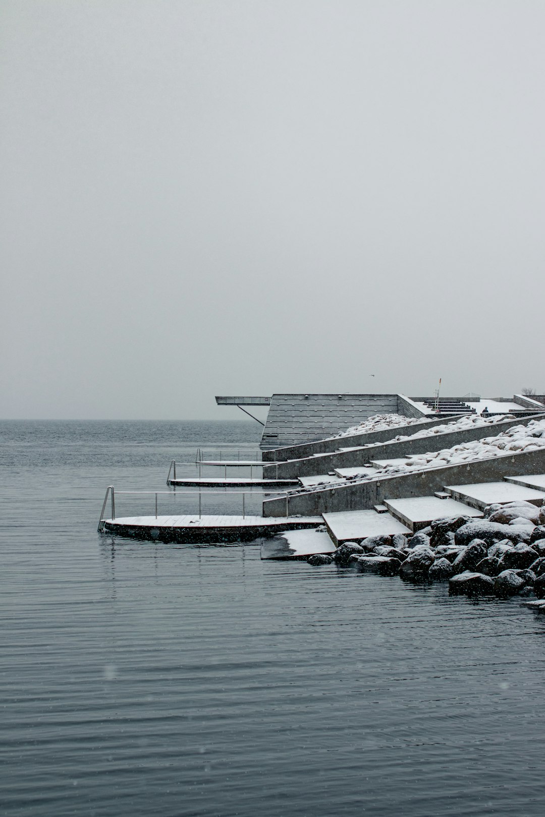 white and black boat on sea during daytime