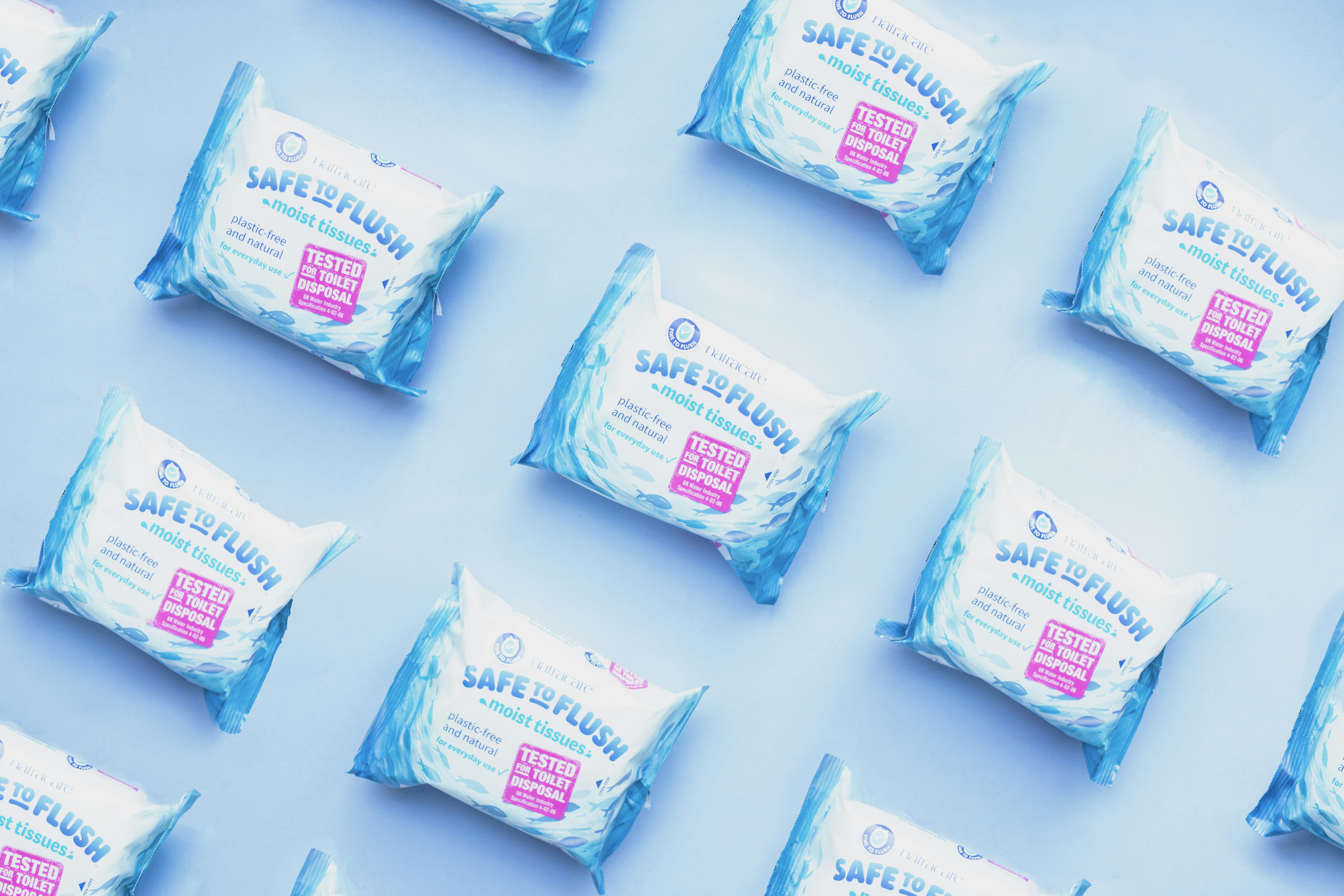 white and pink plastic packs, Natracare