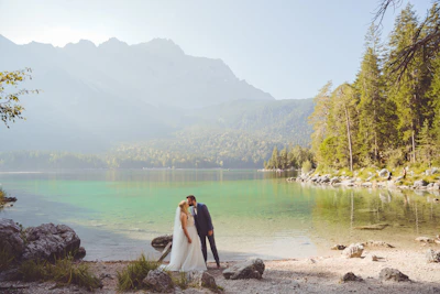 A bride and groom sharing an intimate moment at Villa Balbianello overlooking Lake Como.