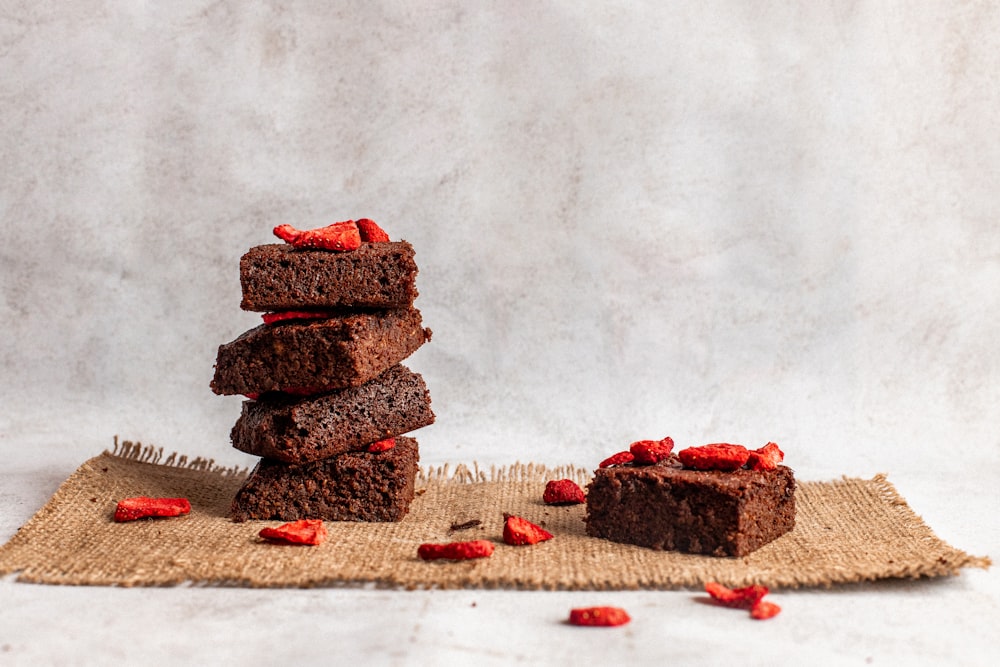 brown and red bread on brown wooden table