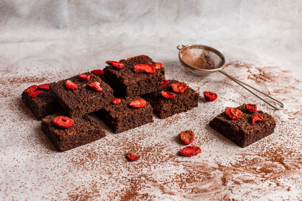 red and brown chocolate cake on white table