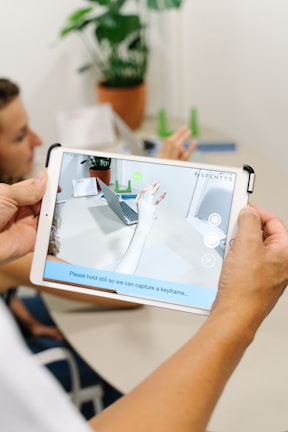 Image showing an iPad app interface featuring augmented reality product visualization.