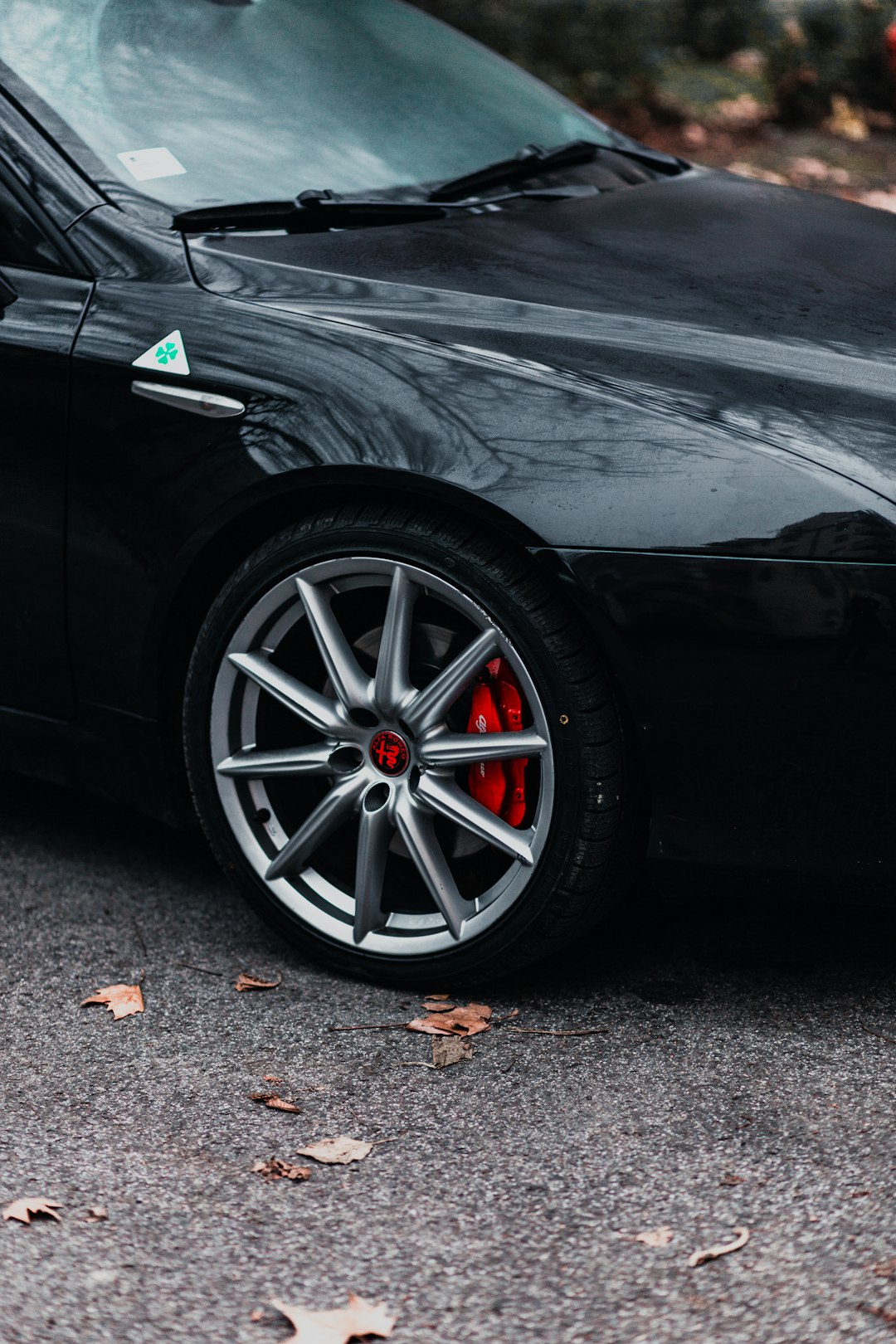 black car with chrome wheel