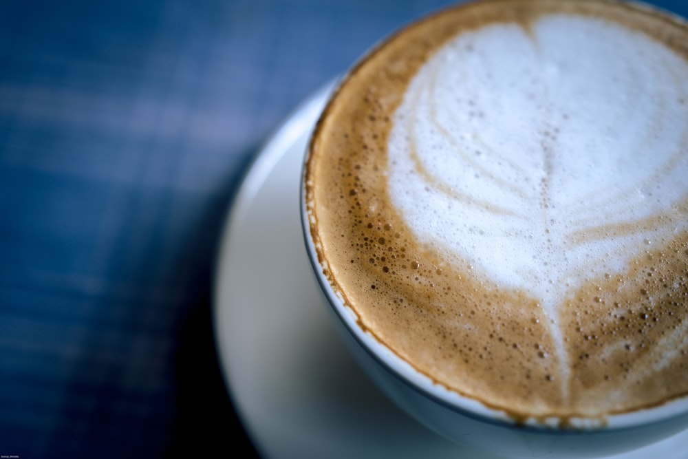 white ceramic mug with coffee