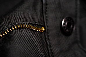 Close-up of a sleek Lumina Apparel jacket highlighting its fine stitching and fabric texture.